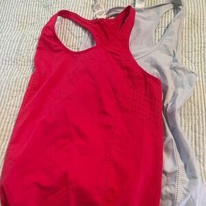 2 tabletops tank tops never worn